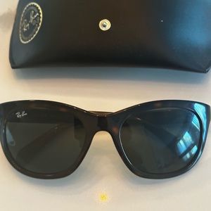 Ray Ban sunglasses.